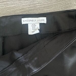 Satin mini skirt asymmetrical hem